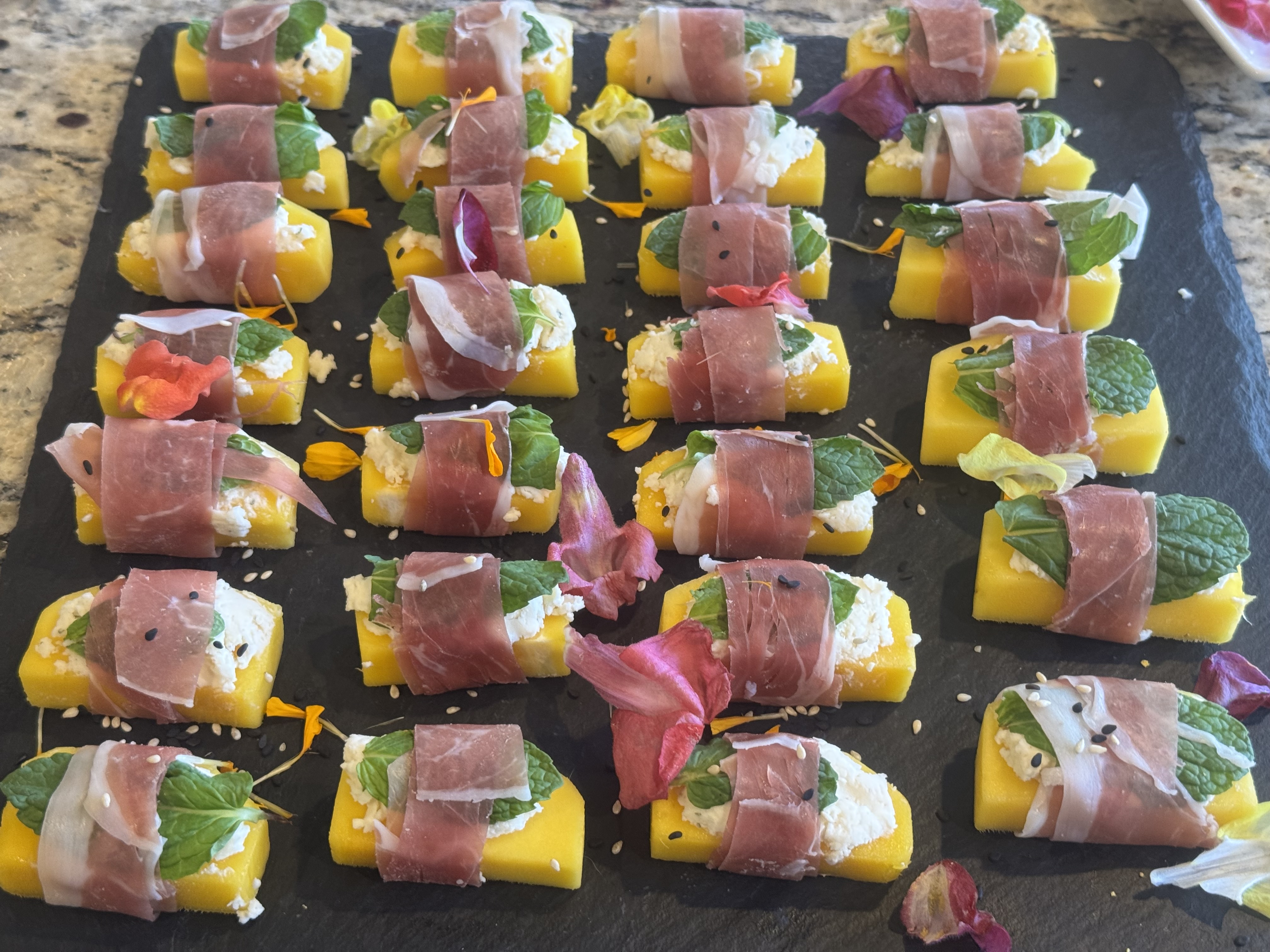 Prosciutto wrapped mango